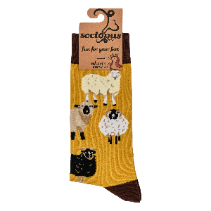 Sock with sheep design on a yellow background, featuring the brand 'soctopus'.