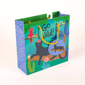 Colorful gift bag with animal illustrations and 'Go Wild!' text on a white background