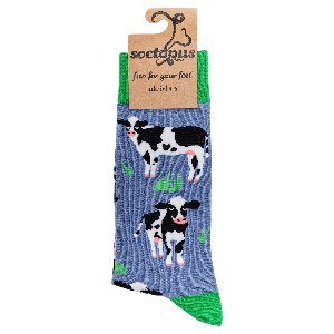 Sock with cow design and 'soctopus' brand packaging on a white background